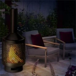 Essos Gartenofen Holzofen Ø45cm Gitterwand Stahlblech Schwarz -Gartenmöbel 10031482 yy 0003 ambient Blumfeldt Essos Gartenofen schwarz